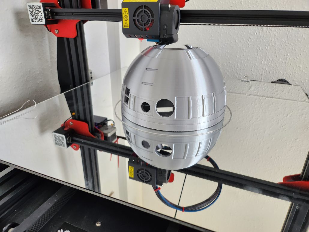 This is my fifth project - Mini R2D2 Droid being printed.