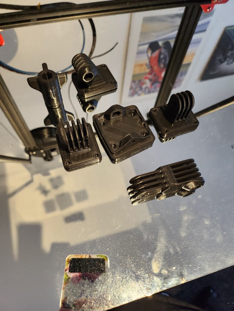 Motorbike parts 3d printed in black filament